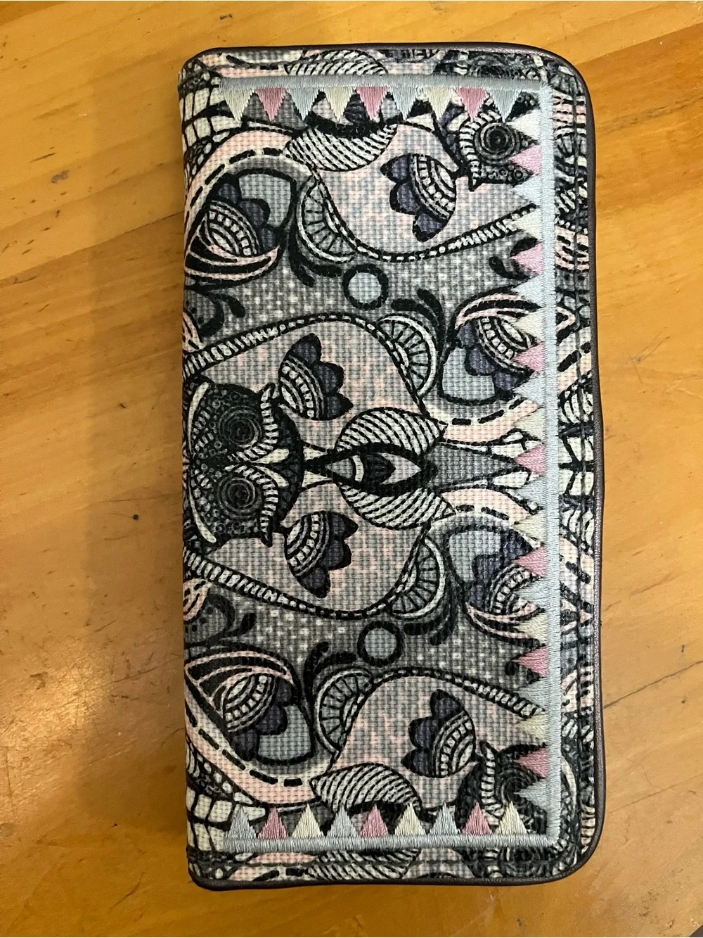Sakroots button closure wallet with owl detail